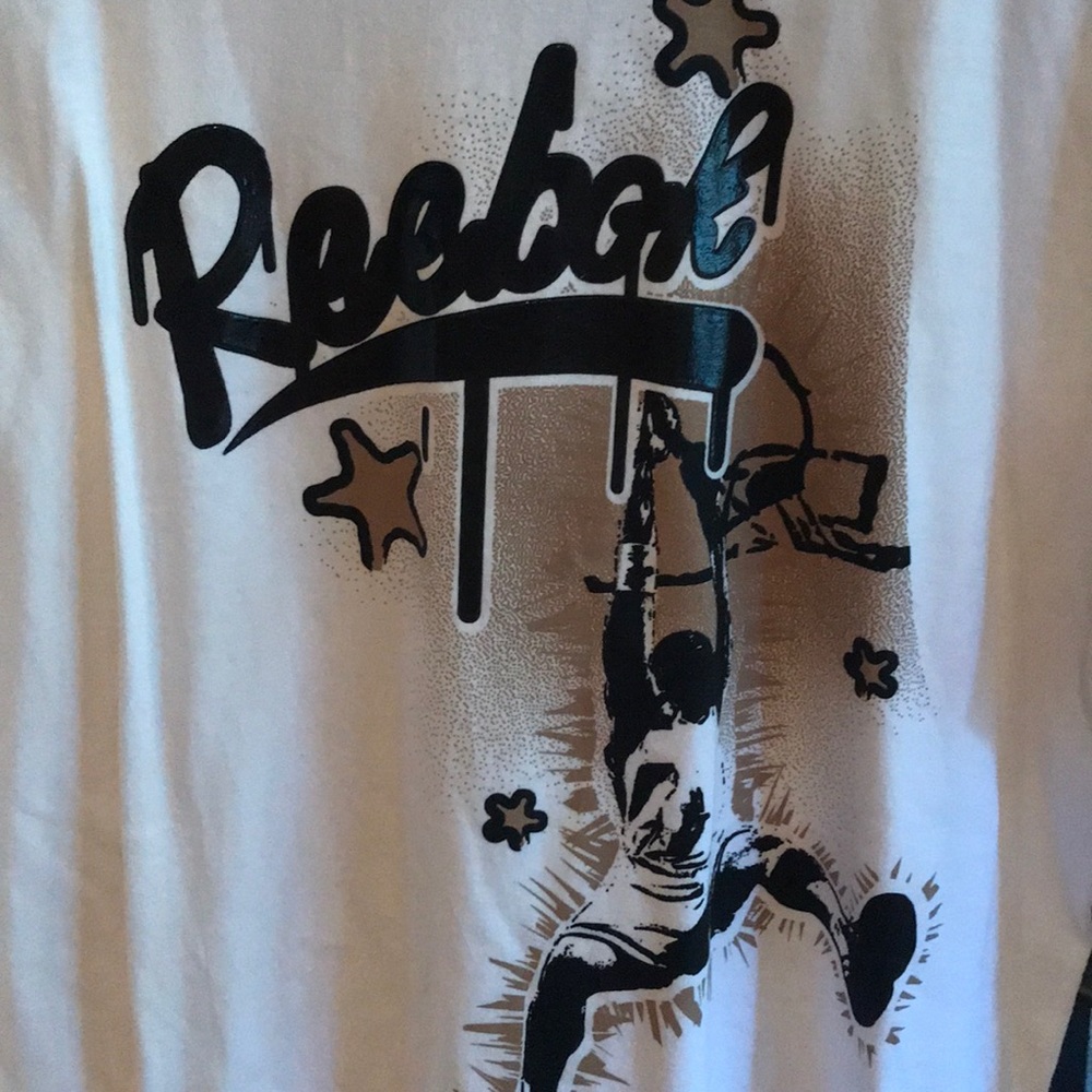 Reebok Boys White Long Shirt. Never enjoyed.